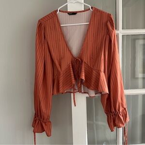 Orange front-tie top with adjustable bell sleeves, size XL